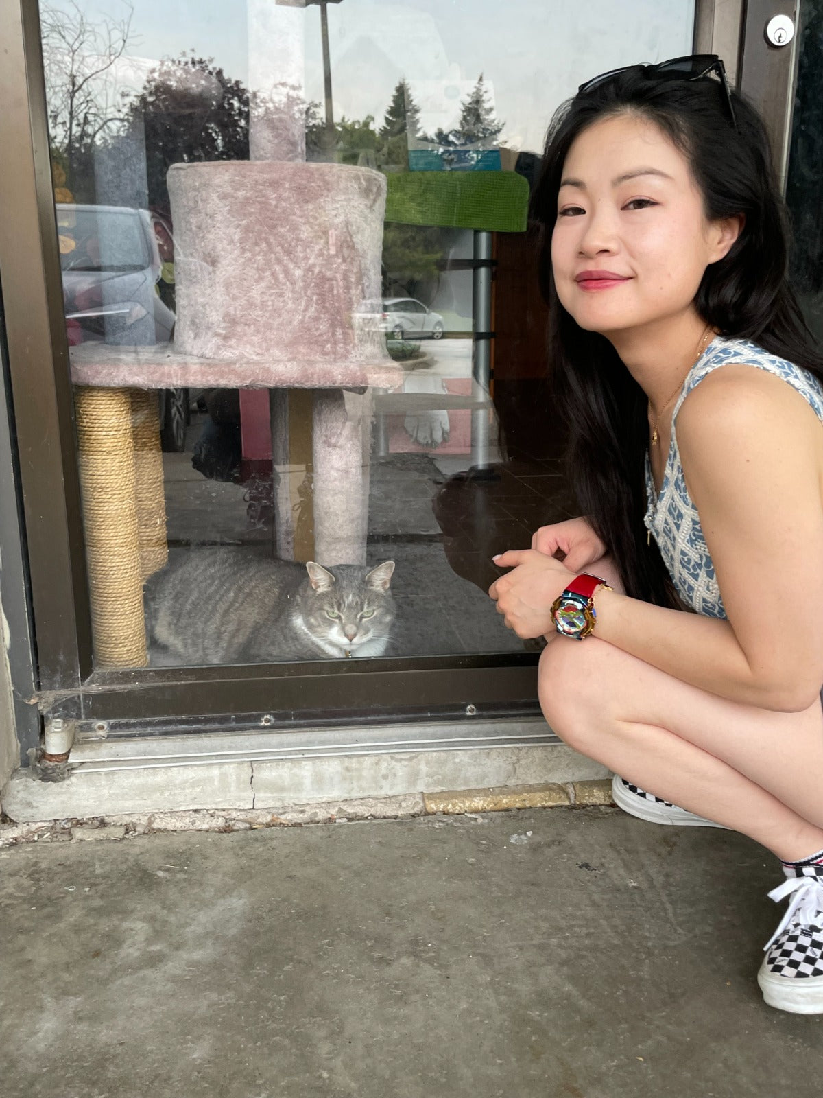 Abbie, bbcat co-host, holding two kittens